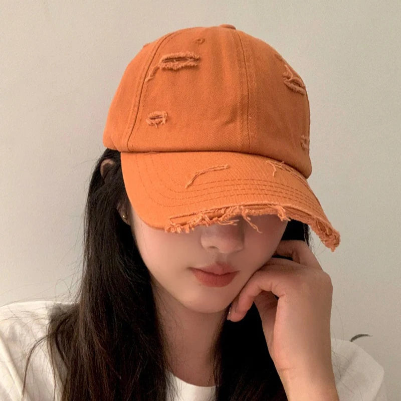 Men's and women's new spring and summer hip-hop versatile soft top curved eave retro personality distressed hole duckbill hat