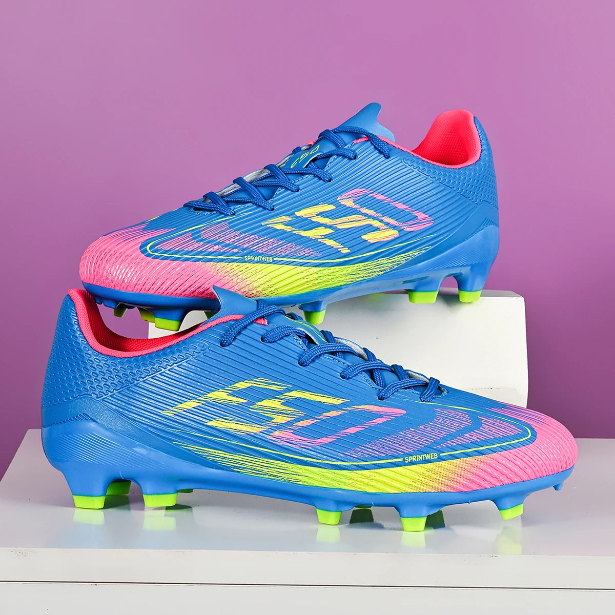 Chaussures de football pour hommes, modèle AG FG hybride, semelle extérieure en caoutchouc résistant à l’usure, tige en PU respirant, idéales pour les matchs sur gazon naturel.