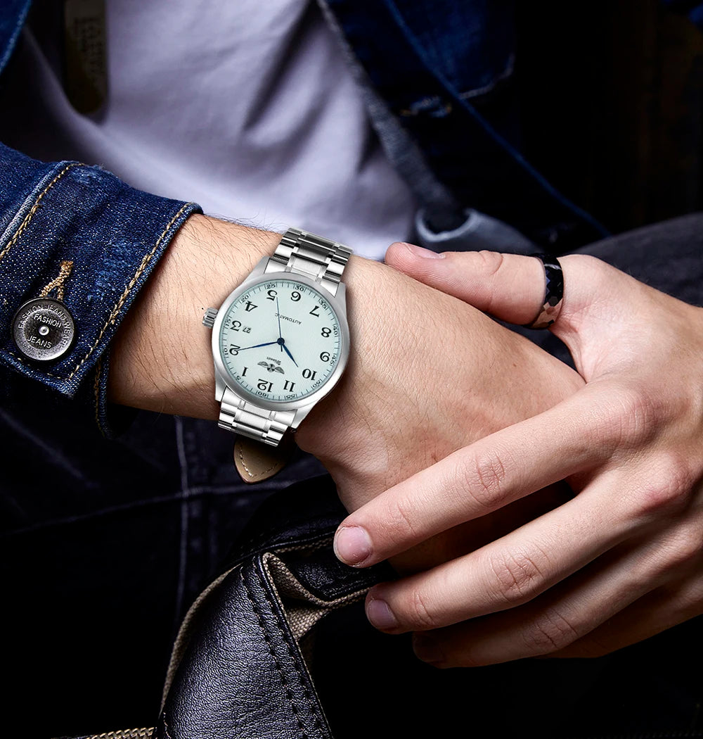 Classic men’s watch – Retro style with date display and blue hands, automatic mechanical movement, prestigious brand, steel case and leather strap